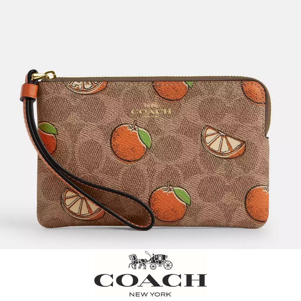 🍊Coach Corner Zip Wristlet In Signature Canvas With Orange Print